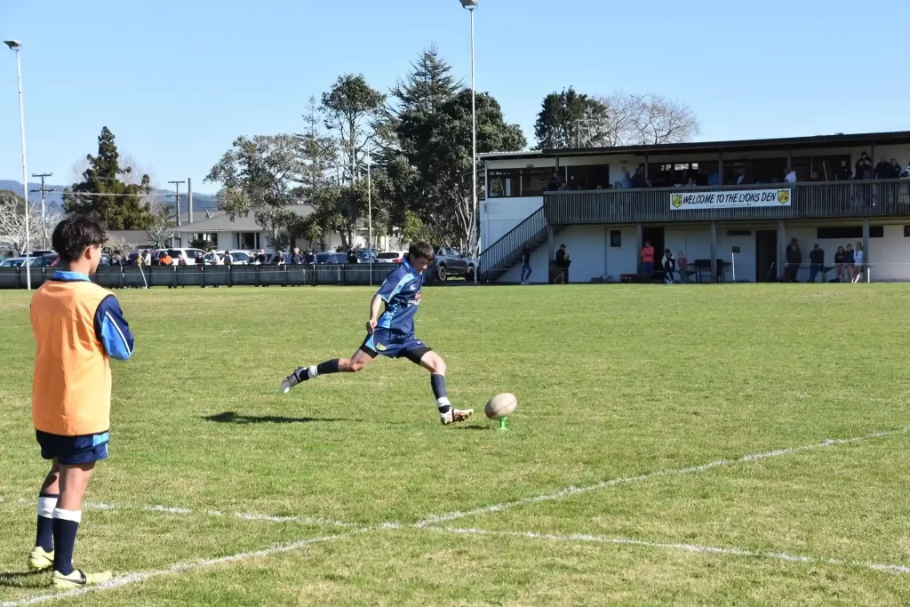 Colville Green kicking the ball
