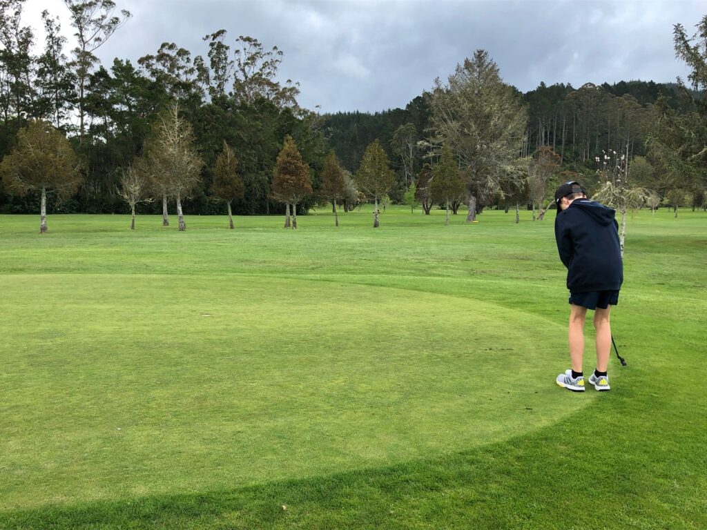 Caleb playing Golf in Coromandel Aotearoa - Whitianga golf park